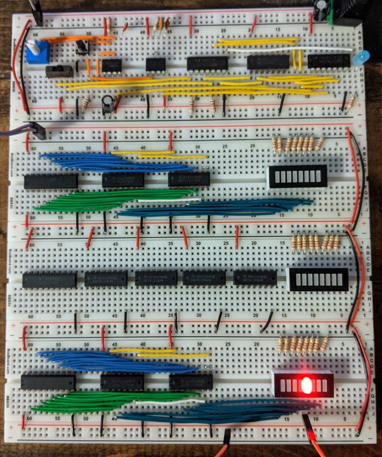 The breadboard XPCI-CT system. (a) A photograph of the system, with